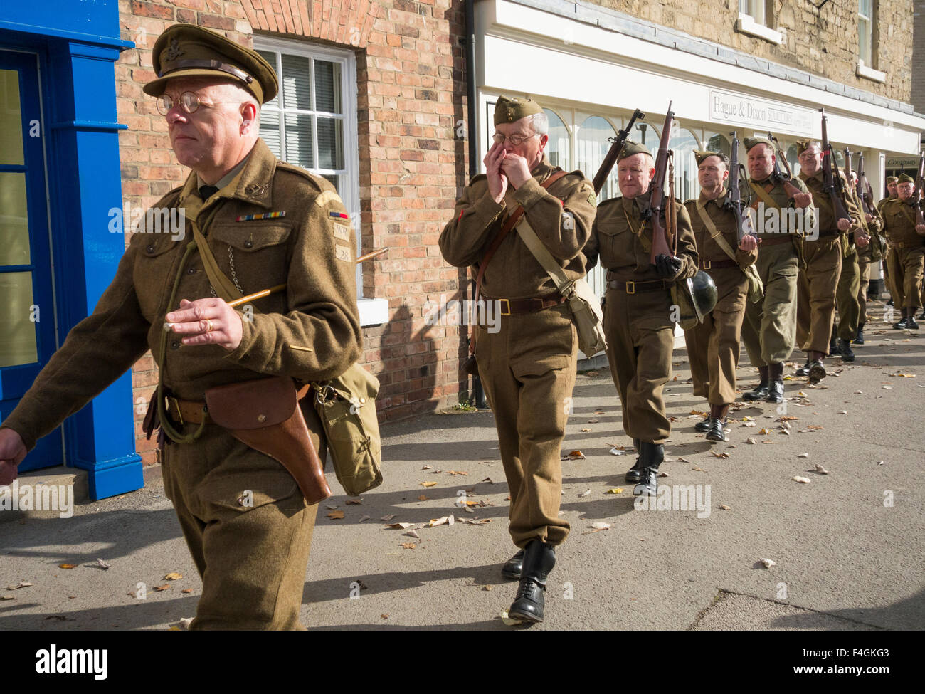 Pickering, North Yorkshire, UK. 17th October, 2015. Pickering`s annual Wartime and 40`s Weekend attracts thousands, with World War 2 living history camps and battle re-enactments amomg the attractions. PICTURED: Home Guard marching through the towng Stock Photo